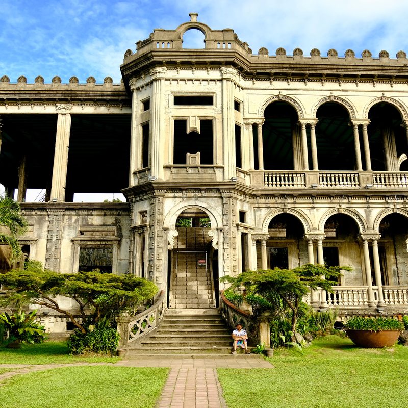 The Ruins, a heritage mansion in Talisay, Negros Occidental, seen across its lawn.
